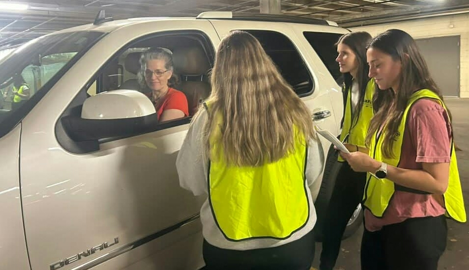 carFit student working with faculty